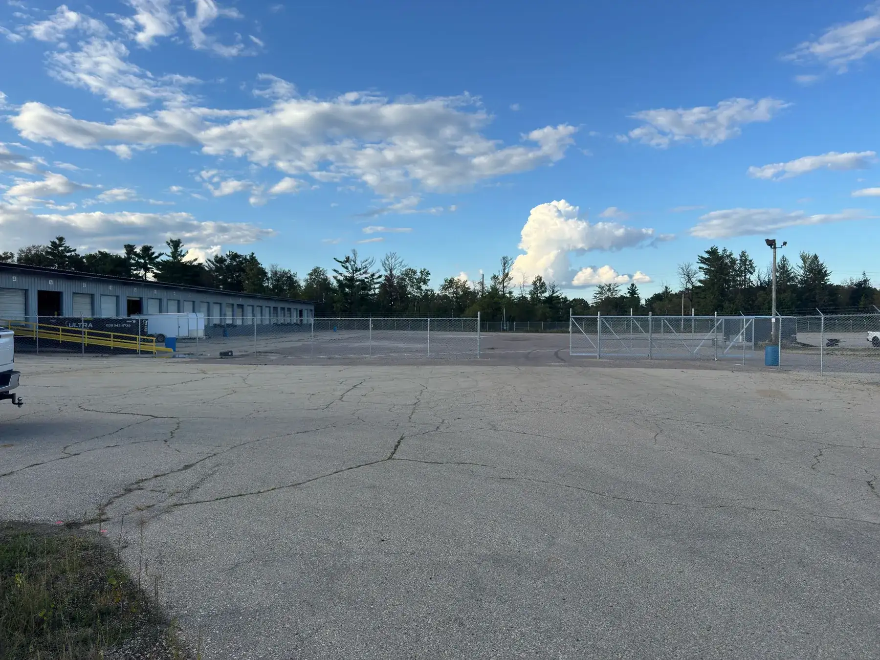 Commercial chain-link perimeter with rolling gates